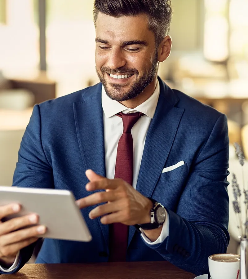 Restaurant manager checking data on tab